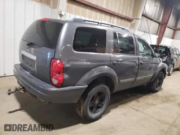 2004 Dodge Durango SLT z VIN 1D4HD48N04F216824, wystawiony jako Copart lot #87756545 z przebiegiem Nie podano mil oraz Nie do naprawy • Non repairable. Historia ofert i sprzedaży dostępna na DreamBid. Obrazek 3.