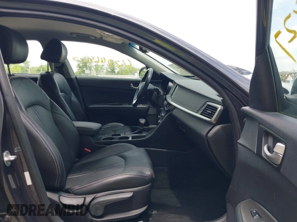 2019 Kia Optima LX z VIN 5XXGT4L32KG298796, wystawiony jako IAAI lot #42266827 z przebiegiem 89 841 mil mil oraz . Historia ofert i sprzedaży dostępna na DreamBid. Obrazek 5.