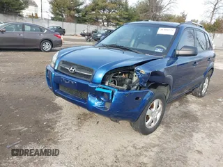 2007 Hyundai Tucson GLS with VIN KM8JM12B77U617990, listed as a IAAI auction lot 41300579 with 167,789 mi miles. Bid and sale history available at carsss.com. Image 2.