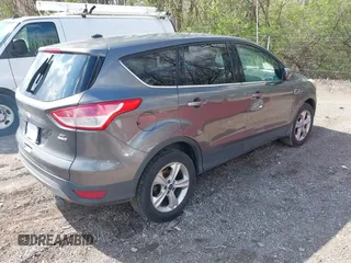 2013 Ford Escape SE with VIN 1FMCU9GX5DUD72758, listed as a IAAI auction lot 41983665 with 282,604 mi miles. Bid and sale history available at carsss.com. Image 4.