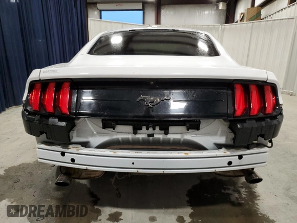 2019 Ford Mustang EcoBoost with VIN 1FA6P8TH0K5157352, listed as a Copart auction lot 86187884 with 69,491 mi miles and Clean Title. Bid and sale history available at carsss.com. Image 6.