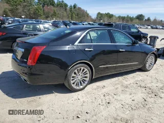 2014 Cadillac CTS Luxury AWD with VIN 1G6AX5S30E0130276, listed as a Copart auction lot 53934825 with 12,850 mi miles and Clean Title. Bid and sale history available at DreamBid. Image 3.