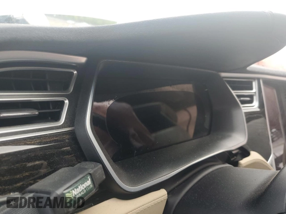 2017 Tesla Model S 60 z VIN 5YJSA1E16HF180191, wystawiony jako Copart lot #55901805 z przebiegiem Nie podano mil oraz Szkoda całkowita • Salvage title. Historia ofert i sprzedaży dostępna na DreamBid. Obrazek 9.