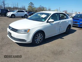 2013 Volkswagen Jetta Sedan SE with VIN 3VWDP7AJ6DM200247, listed as a IAAI auction lot 41989516 with 205,482 mi miles. Bid and sale history available at carsss.com. Image 2.