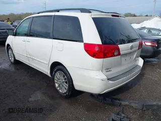 2008 Toyota Sienna LE with VIN 5TDBK23C28S010610, listed as a IAAI auction lot 41944472 with 149,223 mi miles. Bid and sale history available at carsss.com. Image 3.