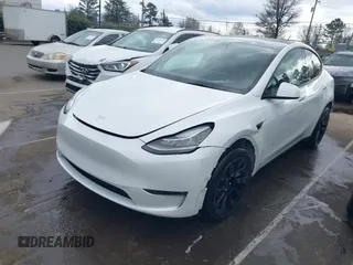 2022 Tesla Model Y Long Range with VIN 7SAYGDEE6NF461788, listed as a IAAI auction lot 41697064 with 34,034 mi miles and . Bid and sale history available at carsss.com. Image 18.