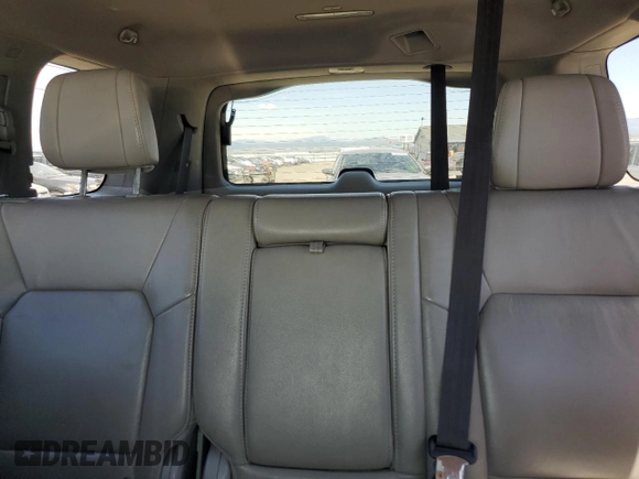2012 Honda Pilot EX-L z VIN 5FNYF4H52CB084031, wystawiony jako Copart lot #59627595 z przebiegiem 171 818 mil mil oraz Czysty tytuł • Clean title. Historia ofert i sprzedaży dostępna na DreamBid. Obrazek 10.