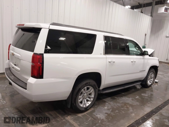2020 Chevrolet Suburban LT with VIN 1GNSKHKC5LR108971, listed as a IAAI auction lot 41651417 with 90,674 mi miles. Bid and sale history available at carsss.com. Image 13.