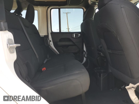 2019 Jeep Wrangler Unlimited Sahara с VIN 1C4HJXEN4KW593522, выставлен на аукционе Copart как лот 57528955 с пробегом 77 382 миль миль и Списание • Salvage title. История ставок и продаж доступна на DreamBid. Изображение 11.