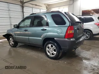 2005 Kia Sportage LX with VIN KNDJE723657083048, listed as a Copart auction lot 85794364 with 172,420 mi miles and Salvage Title. Bid and sale history available at carsss.com. Image 2.