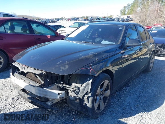 2012 BMW 3 Series 328i with VIN WBA3A5C58CF258408, listed as a IAAI auction lot 41597446 with 227,855 mi miles. Bid and sale history available at carsss.com. Image 2.