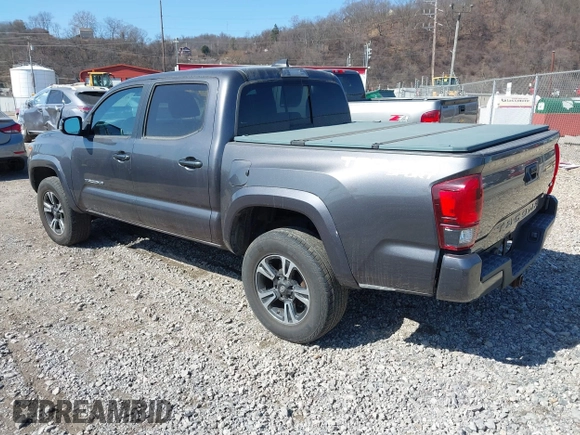 2018 Toyota Tacoma SR with VIN 5TFCZ5AN9JX123749, listed as a IAAI auction lot 41768884 with 42,852 mi miles and . Bid and sale history available at DreamBid. Image 3.