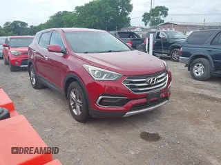 2017 Hyundai Santa Fe 2.4L z VIN 5XYZT3LB5HG497405, wystawiony jako IAAI lot #42440844 z przebiegiem 128 200 mil mil oraz . Historia ofert i sprzedaży dostępna na DreamBid. Obrazek 1.