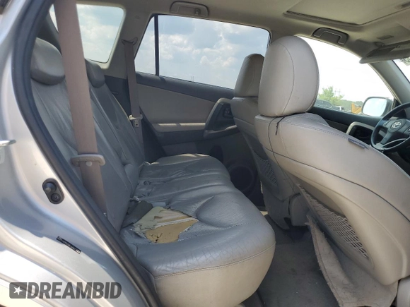 2010 Toyota RAV4 Limited z VIN JTMYF4DV3AD016055, wystawiony jako Copart lot #61856835 z przebiegiem 202 832 mil mil oraz Szkoda całkowita • Salvage title. Historia ofert i sprzedaży dostępna na DreamBid. Obrazek 11.
