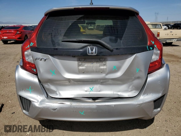 2016 Honda Fit LX z VIN JHMGK5H53GX009541, wystawiony jako Copart lot #56158035 z przebiegiem 260 565 mil mil oraz Szkody całkowita. Historia ofert i sprzedaży dostępna na DreamBid. Obrazek 6.
