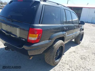 2002 Jeep Grand Cherokee Limited with VIN 1J4GW58N62C308103, listed as a IAAI auction lot 41760396 with 247,152 mi miles. Bid and sale history available at carsss.com. Image 4.