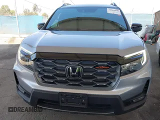 2023 Honda Passport TrailSport with VIN 5FNYF8H61PB028829, listed as a IAAI auction lot 41968490 with 20,090 mi miles. Bid and sale history available at carsss.com. Image 12.