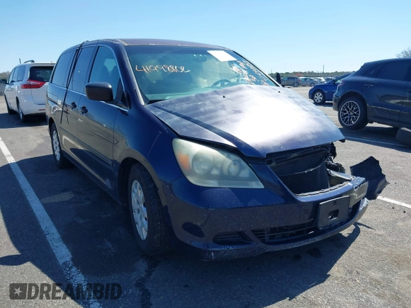 2007 Honda Odyssey LX with VIN 5FNRL38277B098798, listed as a IAAI auction lot 41998802 with 205,657 mi miles and . Bid and sale history available at carsss.com. Image 1.