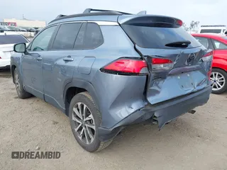 2022 Toyota Corolla Cross XLE with VIN 7MUDAABG6NV007009, listed as a IAAI auction lot 42409061 with 37,178 mi miles and . Bid and sale history available at DreamBid. Image 3.