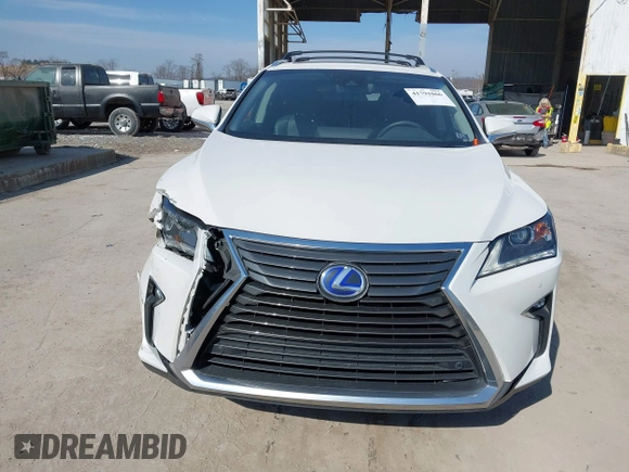 2016 Lexus RX 450h with VIN 2T2BGMCAXGC004844, listed as a IAAI auction lot 41791066 with 100,604 mi miles and . Bid and sale history available at DreamBid. Image 12.