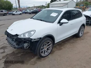 2014 Porsche Cayenne with VIN WP1AA2A27ELA09019, listed as a IAAI auction lot 42068012 with 77,997 mi miles and . Bid and sale history available at DreamBid. Image 19.
