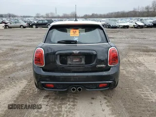 2021 MINI Hardtop 4 Door Cooper S с VIN WMWXU9C04M2M96933, выставлен на аукционе Copart как лот 80886524 с пробегом 60 746 миль миль и Списание • Salvage title. История ставок и продаж доступна на DreamBid. Изображение 6.