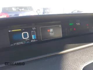 2021 Toyota Prius L Eco with VIN JTDKAMFU7M3133544, listed as a IAAI auction lot 41548653 with 115,214 mi miles and . Bid and sale history available at DreamBid. Image 7.