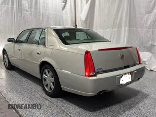 2007 Cadillac DTS V8 z VIN 1G6KD57Y27U198589, wystawiony jako Copart lot #59233755 z przebiegiem 171 023 mil mil oraz Tytuł czysty. Historia ofert i sprzedaży dostępna na DreamBid. Obrazek 3.