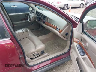 2001 Buick LeSabre Limited z VIN 1G4HR54K41U100044, wystawiony jako IAAI lot #42215795 z przebiegiem 125 144 mil mil oraz . Historia ofert i sprzedaży dostępna na DreamBid. Obrazek 5.