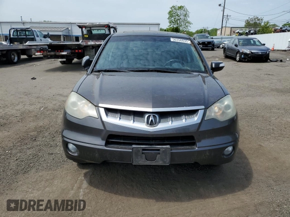 2009 Acura RDX z VIN 5J8TB18289A004485, wystawiony jako Copart lot #56356035 z przebiegiem 228 783 mil mil oraz Szkoda całkowita • Salvage title. Historia ofert i sprzedaży dostępna na DreamBid. Obrazek 5.