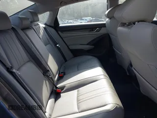 2020 Honda Accord Touring with VIN 1HGCV3F90LA013434, listed as a IAAI auction lot 42075502 with 56,645 mi miles and . Bid and sale history available at DreamBid. Image 8.