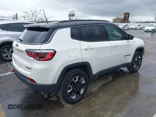 2018 Jeep Compass Trailhawk with VIN 3C4NJDDB0JT306898, listed as a IAAI auction lot 41798954 with 75,852 mi miles and . Bid and sale history available at carsss.com. Image 4.