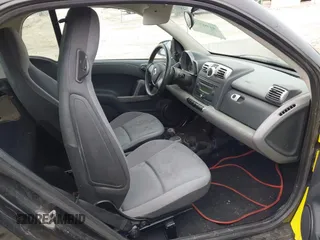 2008 Smart fortwo Pure z VIN WMEEJ31X58K163695, wystawiony jako IAAI lot #41967790 z przebiegiem 133 970 mil mil oraz . Historia ofert i sprzedaży dostępna na DreamBid. Obrazek 5.