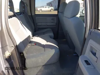 2005 Dodge Dakota SLT with VIN 1D7HW48N25S133725, listed as a IAAI auction lot 42074588 with 163,090 mi miles. Bid and sale history available at carsss.com. Image 8.