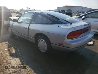 1990 Nissan 240SX z VIN JN1HS36P0LW121487, wystawiony jako Copart lot #70670904 z przebiegiem 123 794 mil mil oraz Szkody całkowita. Historia ofert i sprzedaży dostępna na DreamBid. Obrazek 2.