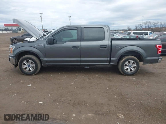 2019 Ford F-150 XL with VIN 1FTEW1CBXKFC64236, listed as a IAAI auction lot 41531279 with 102,965 mi miles and . Bid and sale history available at carsss.com. Image 14.