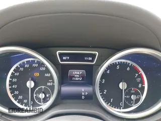 2015 Mercedes-Benz GL-Class GL 450 with VIN 4JGDF6EE8FA542288, listed as a IAAI auction lot 42098527 with 115,312 mi miles. Bid and sale history available at carsss.com. Image 7.