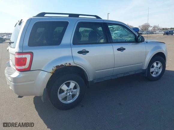 2010 Ford Escape XLT with VIN 1FMCU0DG9AKC24619, listed as a IAAI auction lot 41877371 with 181,043 mi miles. Bid and sale history available at carsss.com. Image 4.