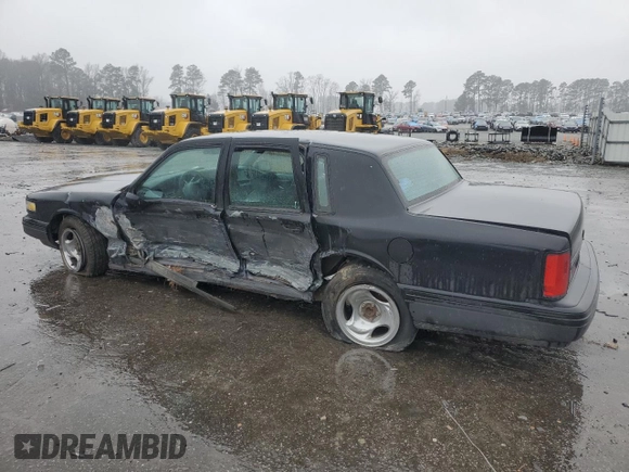 1997 Lincoln Town Car Executive z VIN 1LNLM81W7VY720905, wystawiony jako Copart lot #85910534 z przebiegiem Nie podano mil oraz Szkoda całkowita • Salvage title. Historia ofert i sprzedaży dostępna na DreamBid. Obrazek 2.