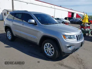2016 Jeep Grand Cherokee Laredo z VIN 1C4RJFAG7GC392261, wystawiony jako IAAI lot #41890922 z przebiegiem 107 546 mil mil oraz . Historia ofert i sprzedaży dostępna na DreamBid. Obrazek 1.