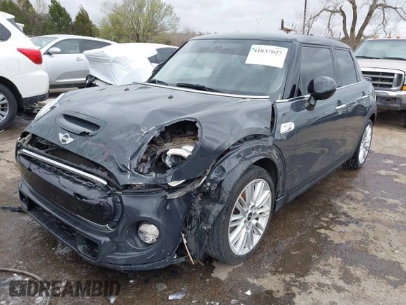 2017 MINI Hardtop 4 Door Cooper S z VIN WMWXU3C3XH2F49201, wystawiony jako IAAI lot #41837027 z przebiegiem 75 949 mil mil oraz . Historia ofert i sprzedaży dostępna na DreamBid. Obrazek 19.
