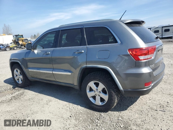 2011 Jeep Grand Cherokee Laredo with VIN 1J4RR4GGXBC702300, listed as a Copart auction lot 49736255 with 163,684 mi miles and Salvage Title. Bid and sale history available at carsss.com. Image 2.