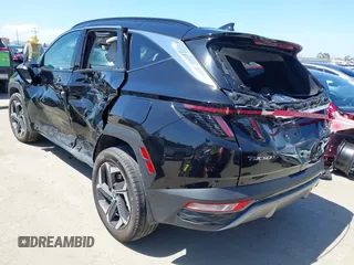 2023 Hyundai Tucson Limited with VIN KM8JECA14PU127220, listed as a IAAI auction lot 42265855 with 59,446 mi miles and . Bid and sale history available at DreamBid. Image 3.
