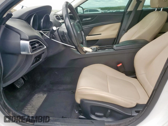 2018 Jaguar XE 25t with VIN SAJAR4FX4JCP31280, listed as a Copart auction lot 50580375 with 125,060 mi miles and Salvage Title. Bid and sale history available at DreamBid. Image 7.