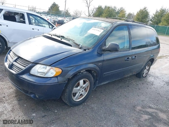 2007 Dodge Grand Caravan SXT with VIN 2D4GP44L37R356984, listed as a IAAI auction lot 41475361 with 153,843 mi miles. Bid and sale history available at carsss.com. Image 2.