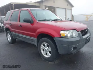 2007 Ford Escape XLT with VIN 1FMCU03147KC00069, listed as a IAAI auction lot 41343434 with 209,220 mi miles. Bid and sale history available at carsss.com. Image 1.