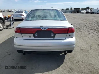 1999 Ford Contour z VIN 1FAFP68G9XK142510, wystawiony jako Copart lot #74818384 z przebiegiem 65 885 mil mil oraz Tytuł czysty. Historia ofert i sprzedaży dostępna na DreamBid. Obrazek 6.