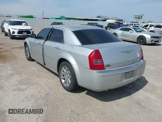 2005 Chrysler 300 with VIN 2C3JA63H05H693522, listed as a IAAI auction lot 41847279 with 162,037 mi miles. Bid and sale history available at carsss.com. Image 3.