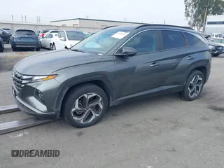 2022 Hyundai Tucson SEL z VIN 5NMJF3AE6NH133724, wystawiony jako IAAI lot #42309502 z przebiegiem 49 156 mil mil oraz . Historia ofert i sprzedaży dostępna na DreamBid. Obrazek 2.
