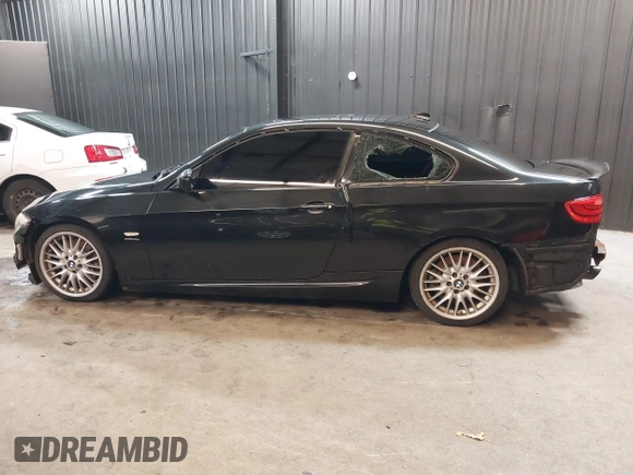 2011 BMW 3 Series 335is with VIN WBAKG1C51BE618450, listed as a IAAI auction lot 41555179 with 100,942 mi miles and . Bid and sale history available at carsss.com. Image 14.